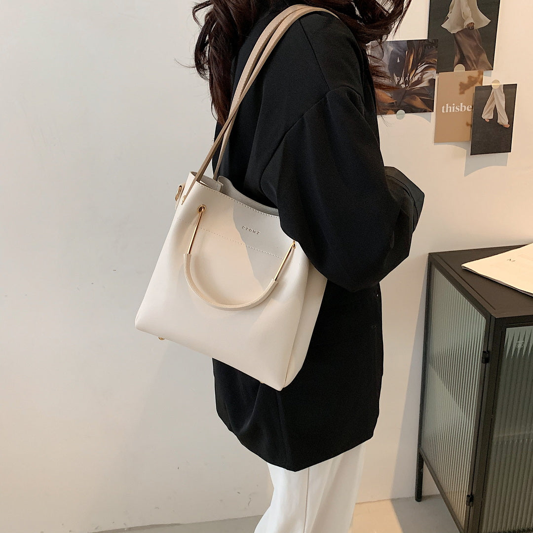 Black contrast bucket cross body online bag